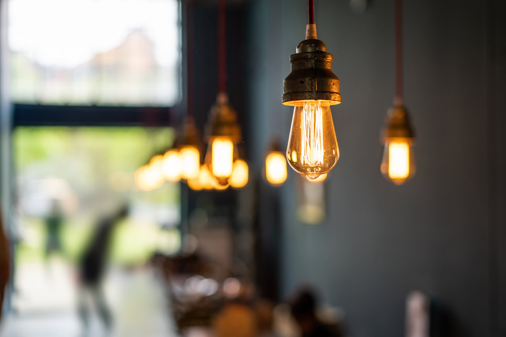 row of illuminated bulbs